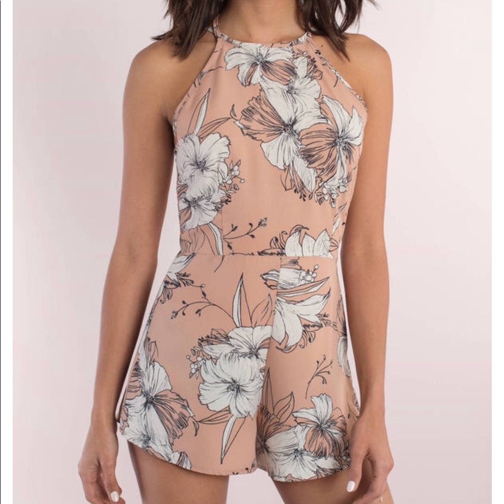 Light pink floral Romper. Brand new. Never worn
